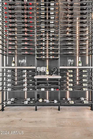 a white toilet sitting next to a bathroom sink