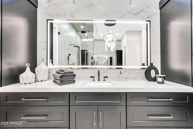 an aerial view of residential houses and outdoor space