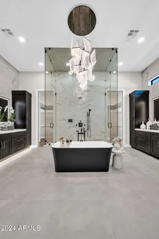 a view of a house with a big yard and potted plants