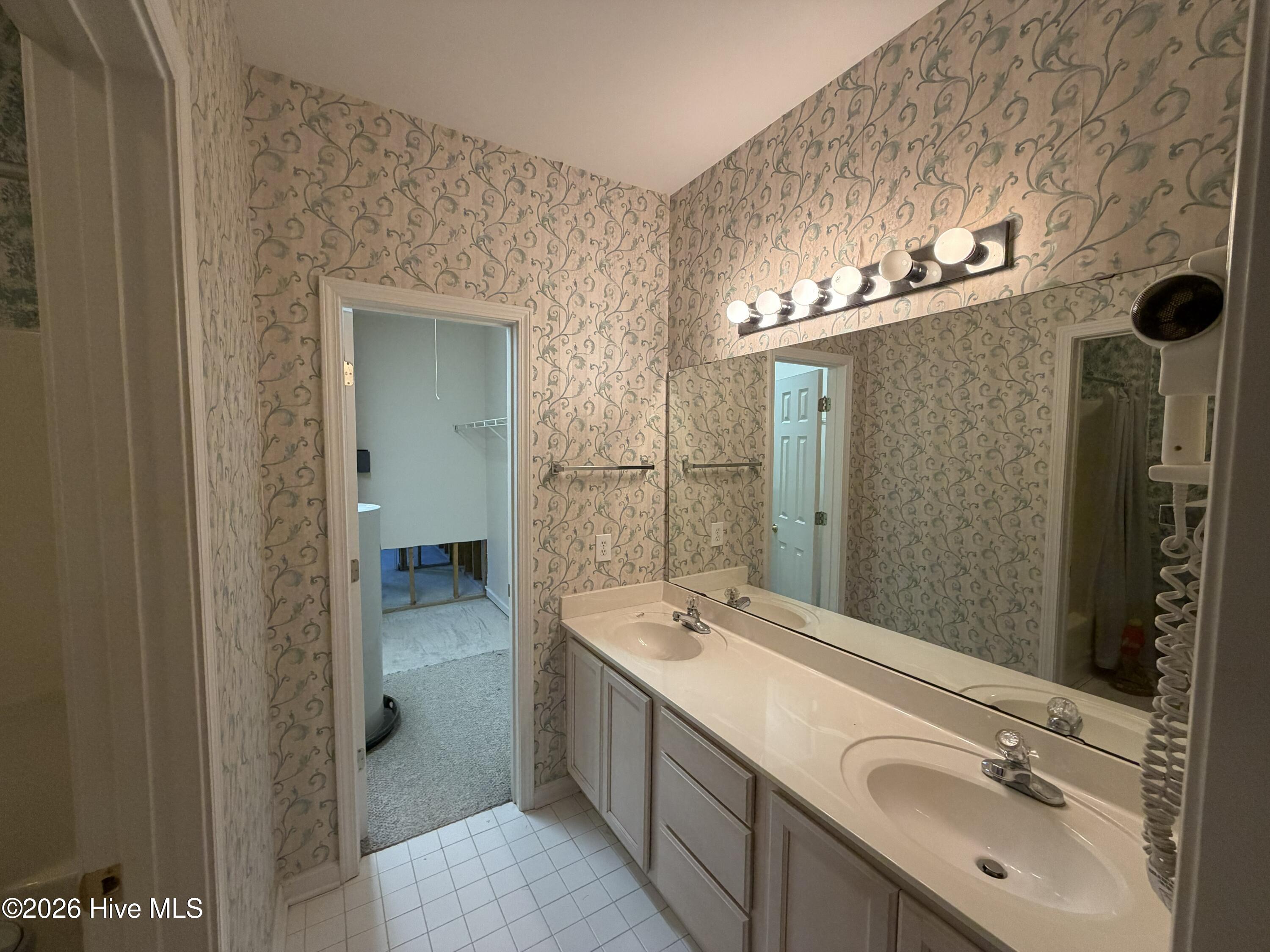 116 Rice Mill Circle, Unit 4 Sunset Beach, NC 28468 - Photo 14 of 29 Primary bathroom.
