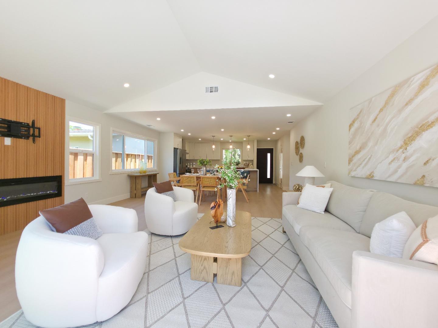 6746 Bollinger Road San Jose, CA 95129 - Photo 11 of 30 a living room with furniture and a table