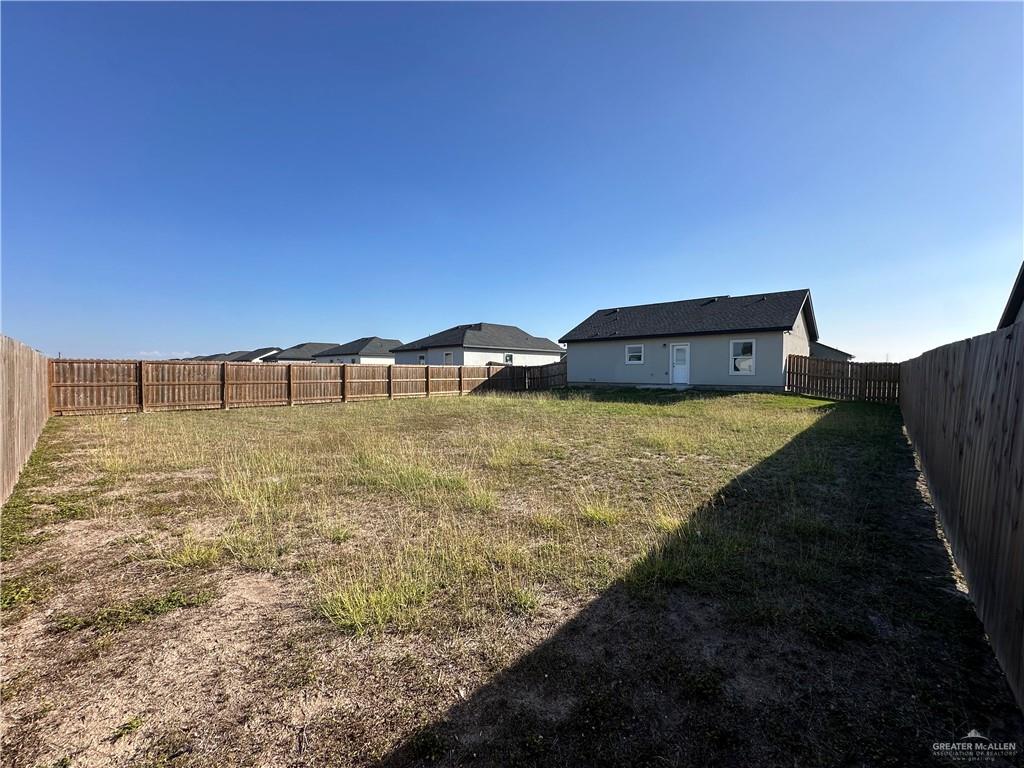 1605 Unity Drive Mercedes, TX 78570 - Photo 10 of 10 a view of a big yard with an outdoor seating