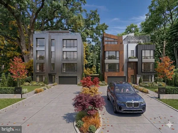 a car parked in front of a brick house