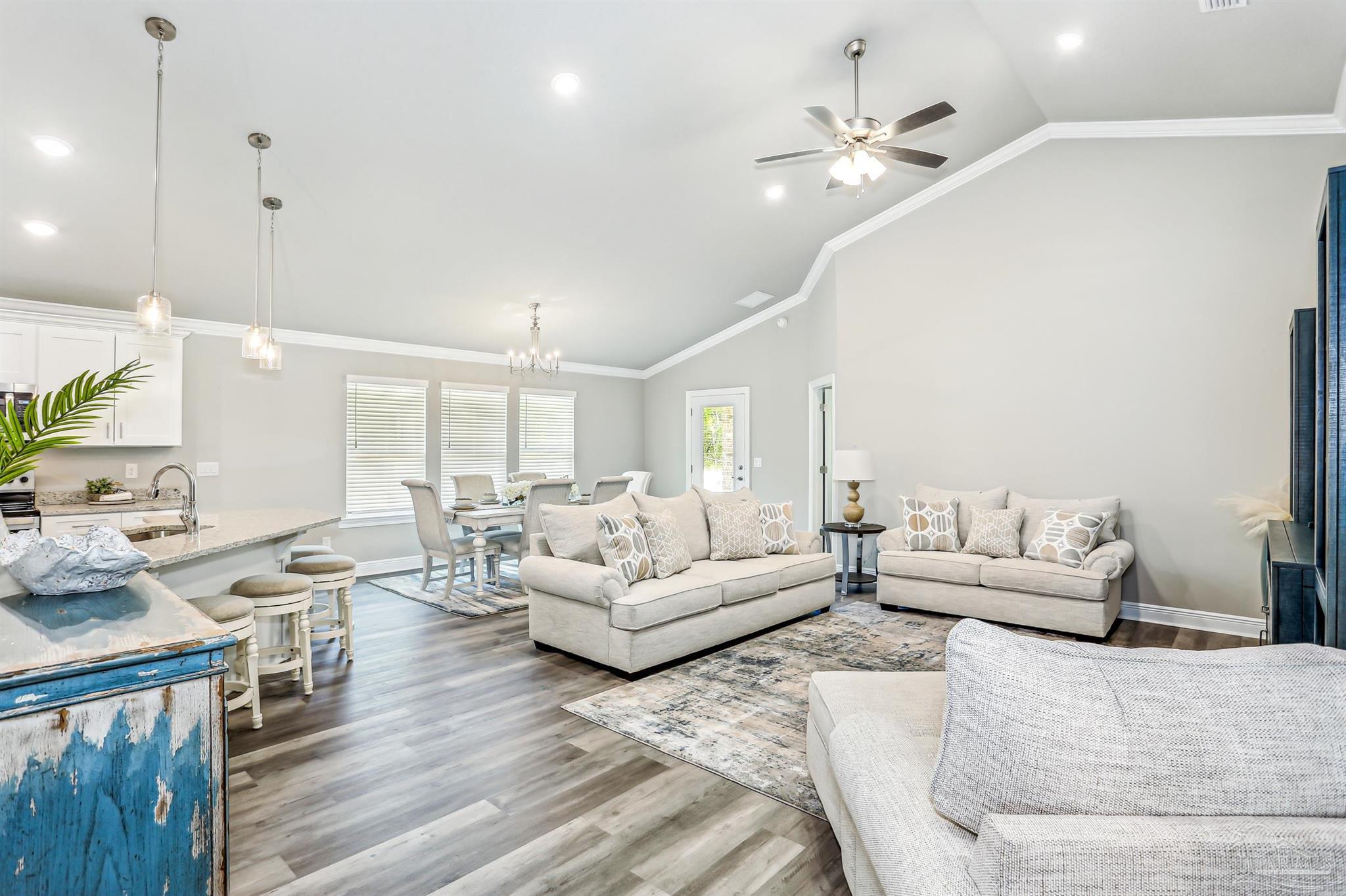 3639 Bob Tolbert Road Navarre, FL 32566 - Photo 5 of 28 a living room with furniture and a large window