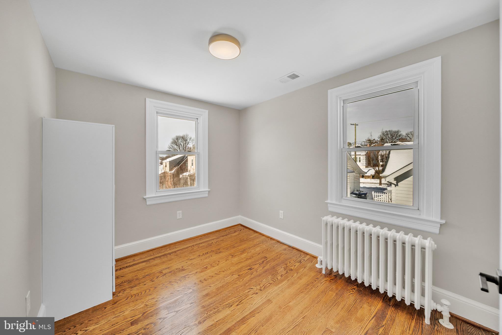 6018 2nd Street Northwest Washington, DC 20011 - Photo 12 of 18 a view of a room with wooden floor and window