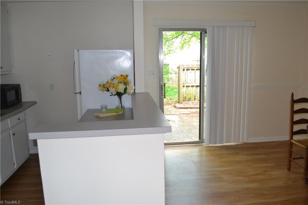 5735 Bramblegate Road Greensboro, NC 27409 - Photo 10 of 20 Kitchen Open to Dining Room