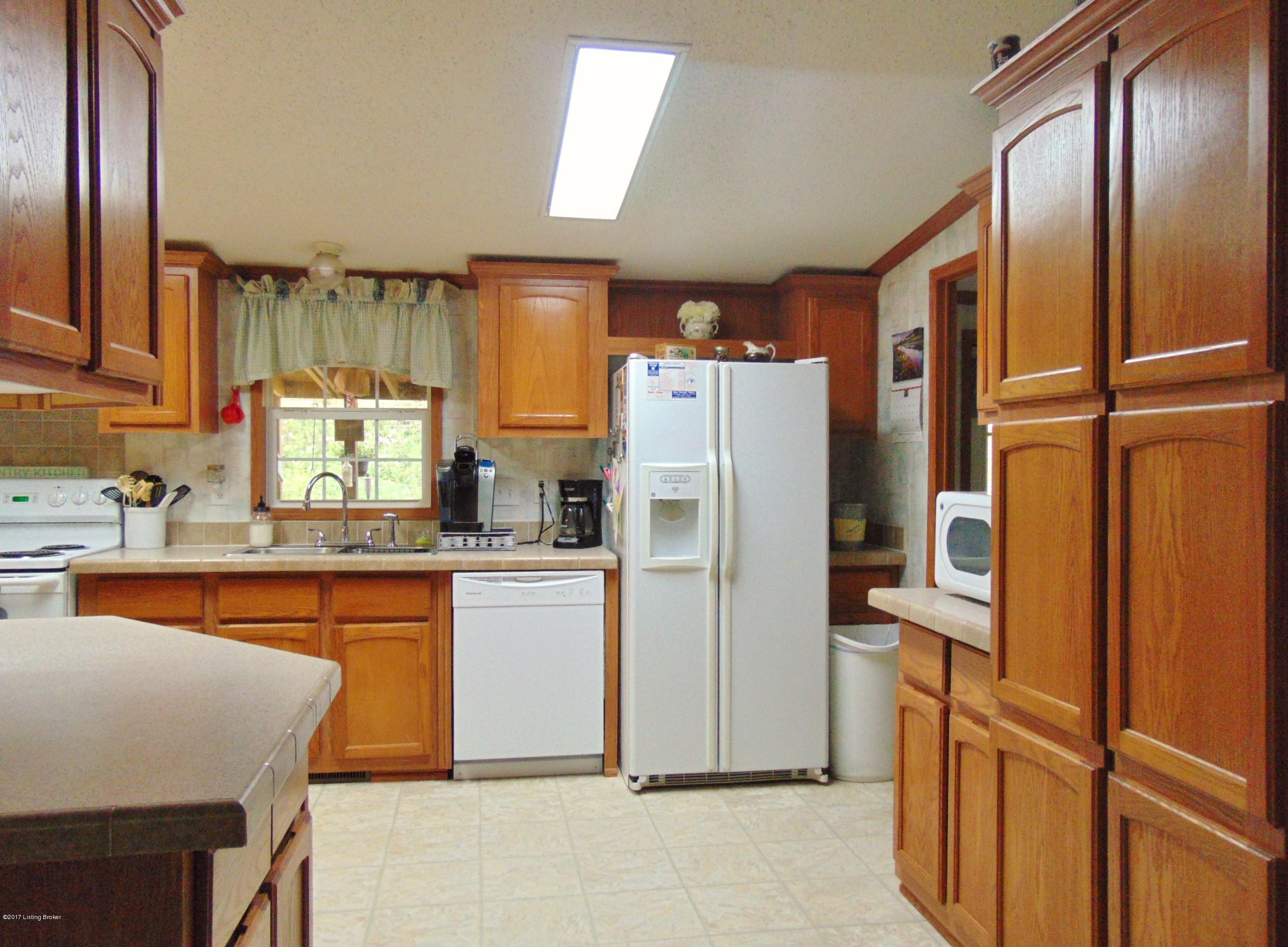 532 West Prong Locust Road Milton, KY 40045 - Photo 15 of 24 This angle is looking from the living room into the large fully equipped kitchen and lots of storage.