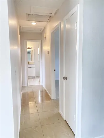 a bathroom with a glass door shower