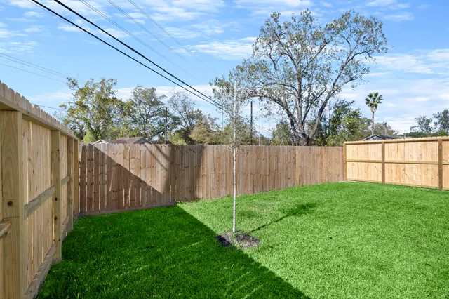 a view of a backyard with a garden
