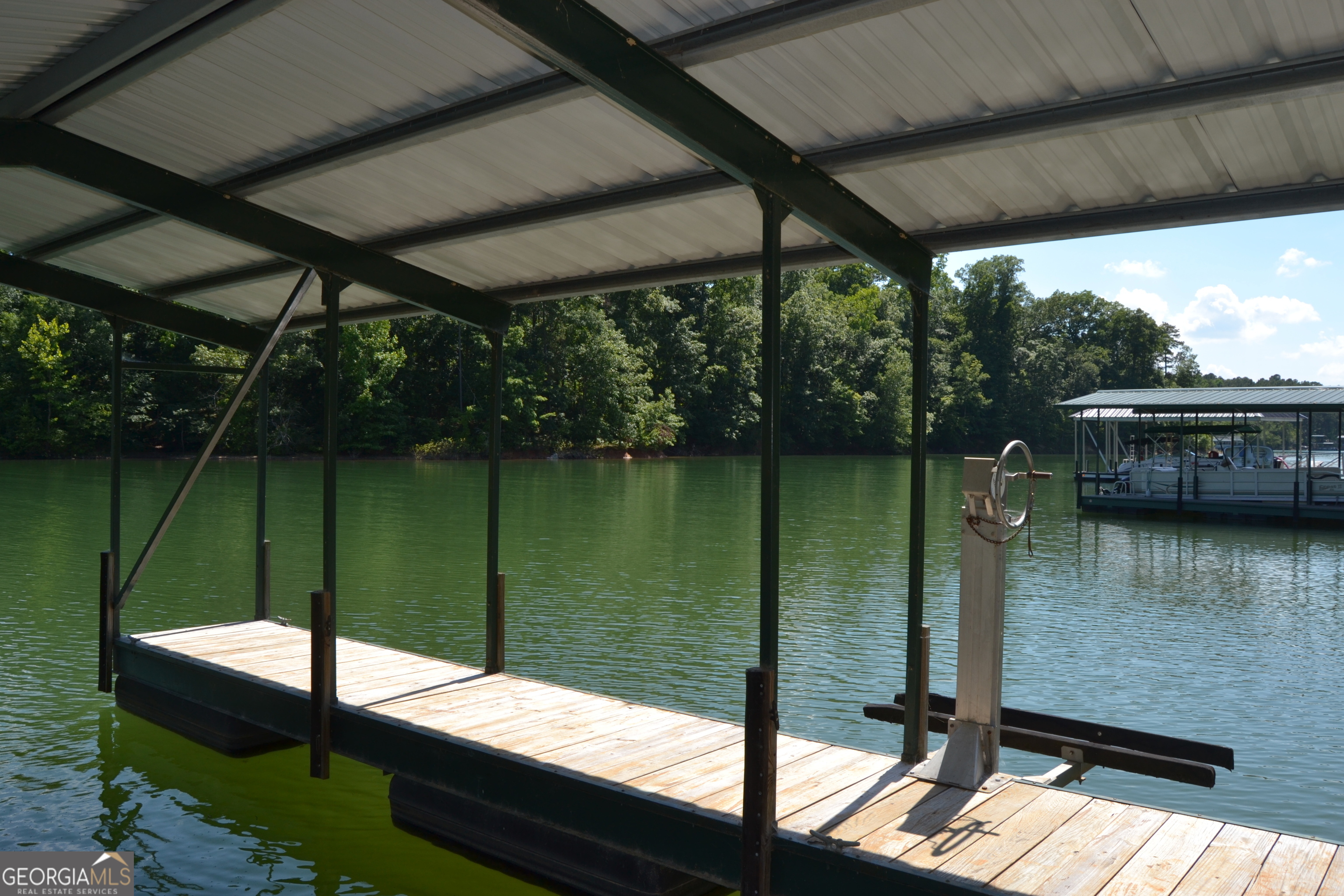 913 Paynes Creek Road, Unit LOT 11 Hartwell, GA 30643 - Photo 6 of 14 a view of a lake from a balcony