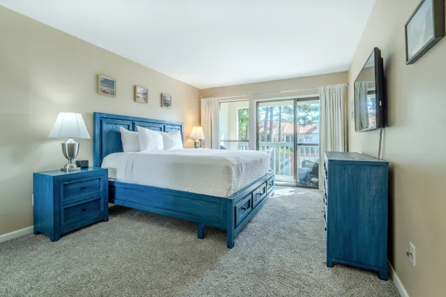 a outdoor living space with furniture and a potted plant