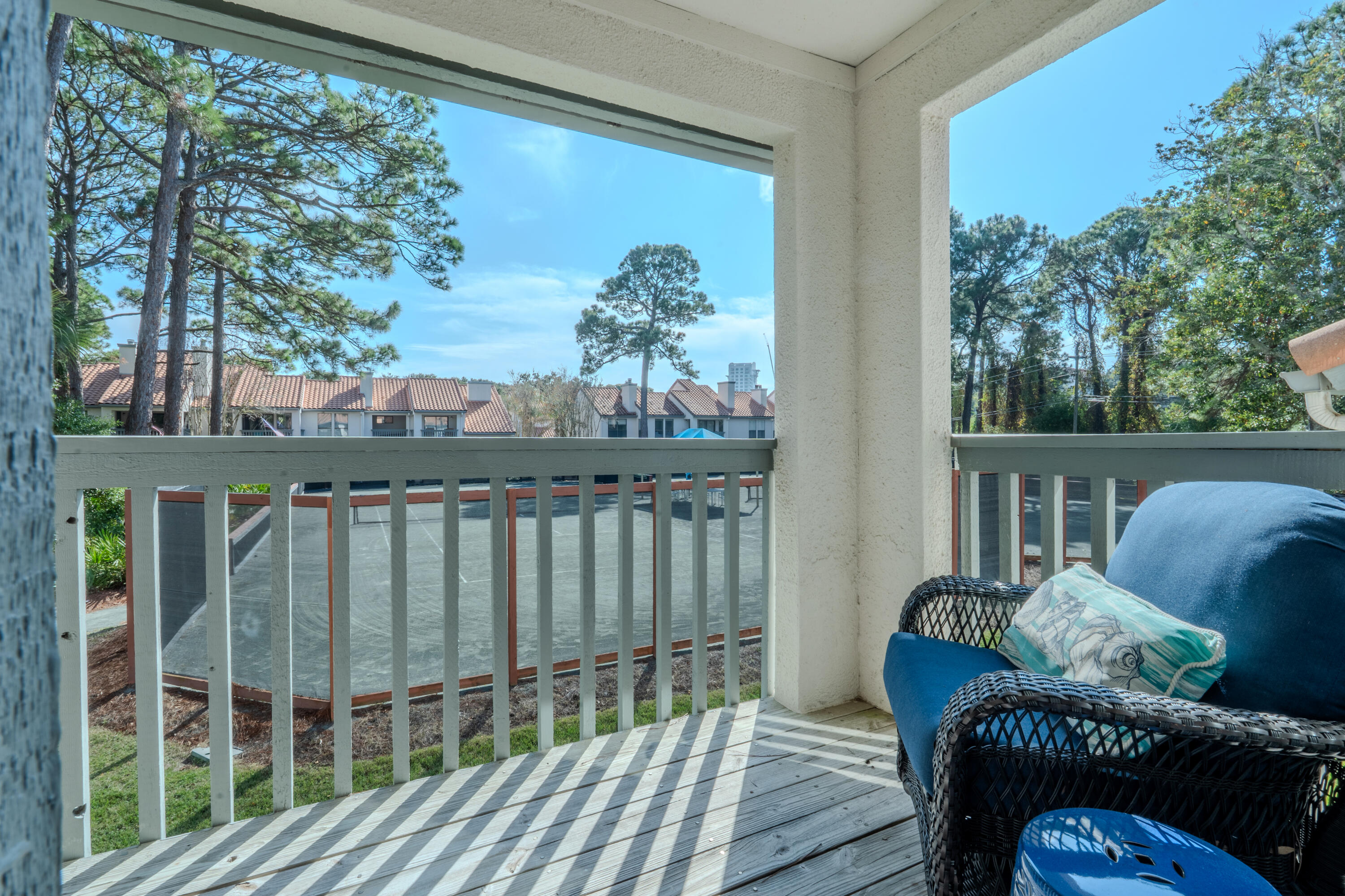7 Wimbledon Court, Unit 7B Miramar Beach, FL 32550 - Photo 26 of 46 a view of a balcony with furniture