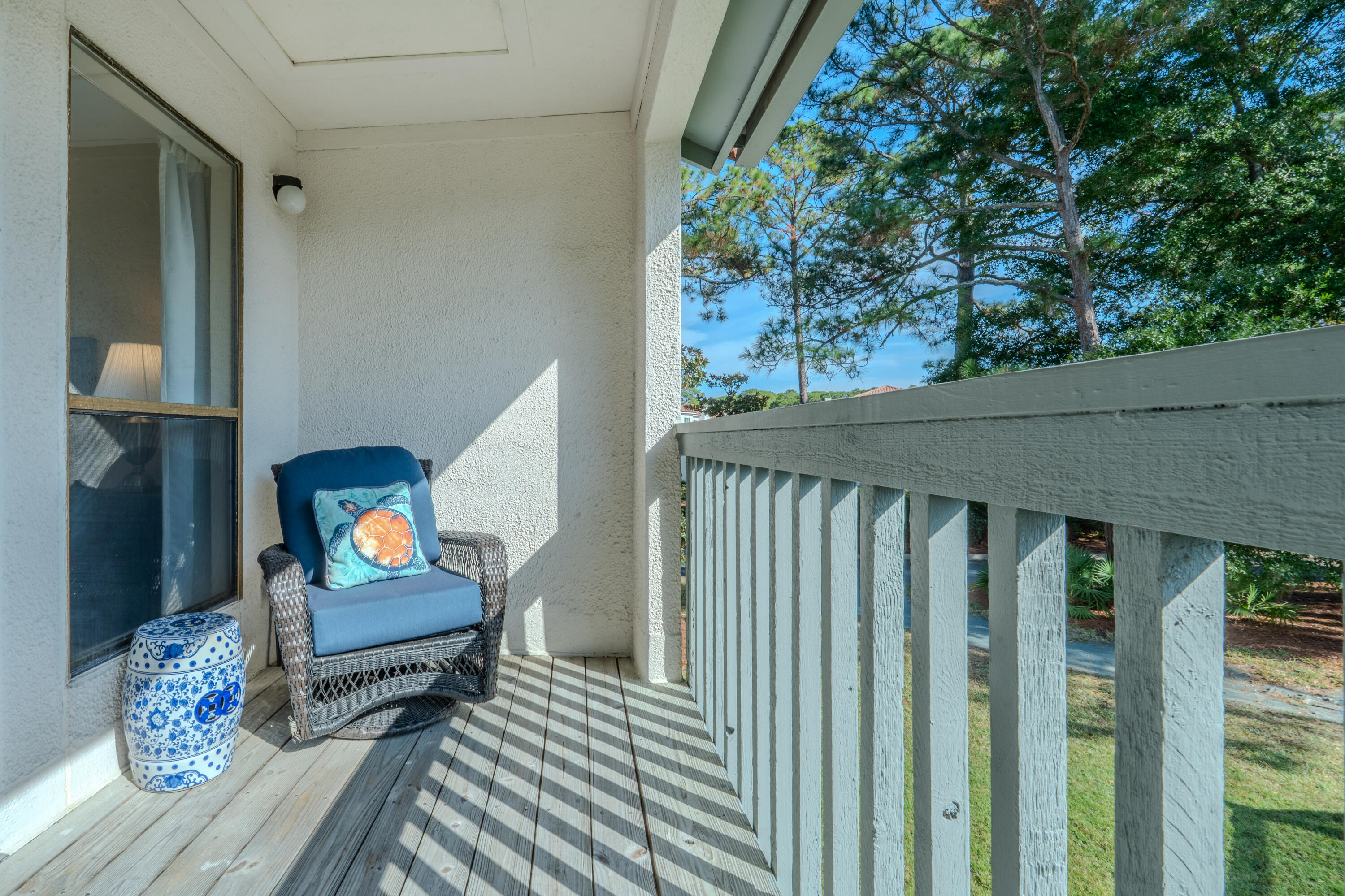 7 Wimbledon Court, Unit 7B Miramar Beach, FL 32550 - Photo 27 of 46 a outdoor living space with furniture and a potted plant