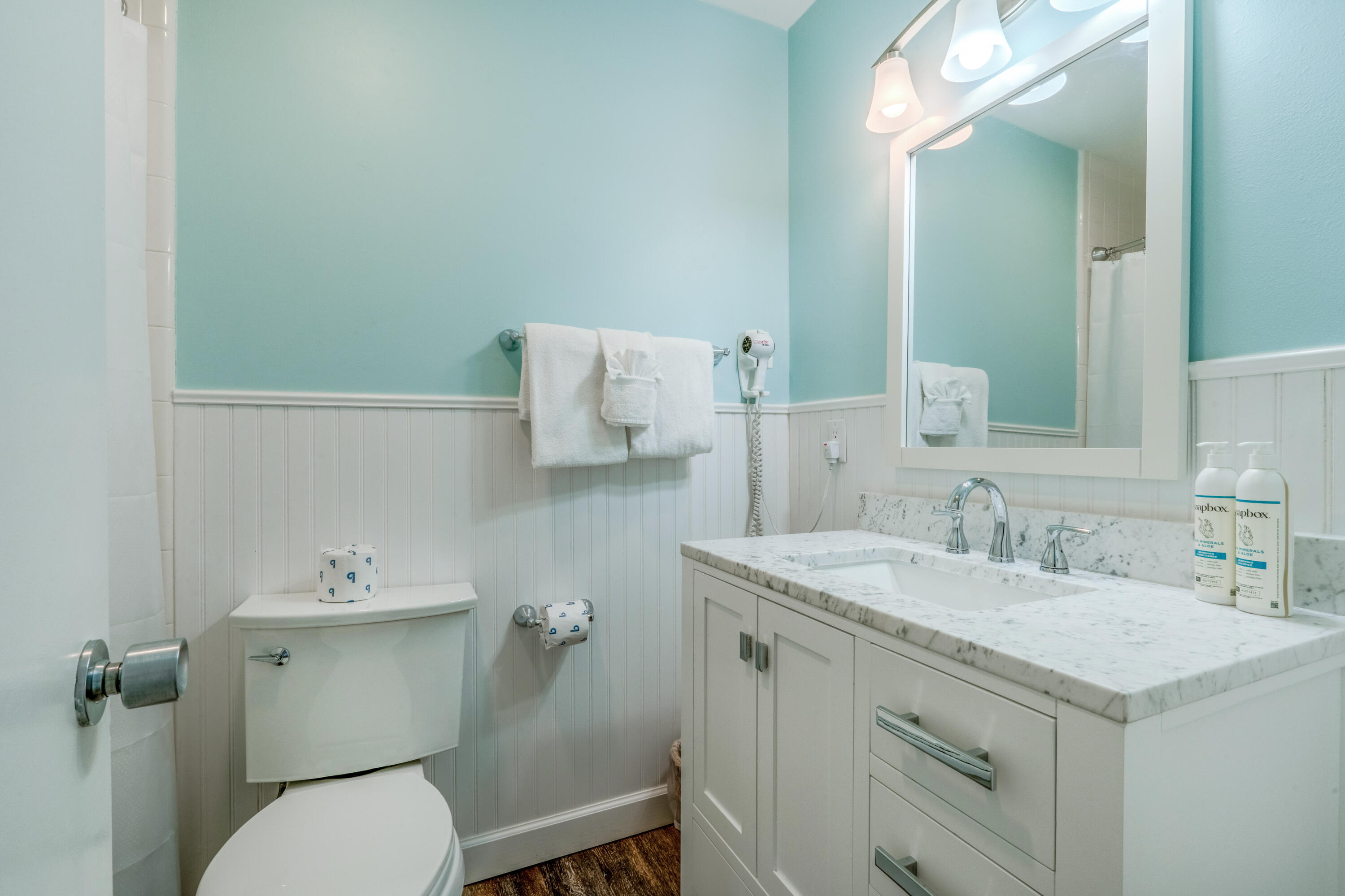 7 Wimbledon Court, Unit 7B Miramar Beach, FL 32550 - Photo 32 of 46 a bathroom with a sink toilet and a mirror