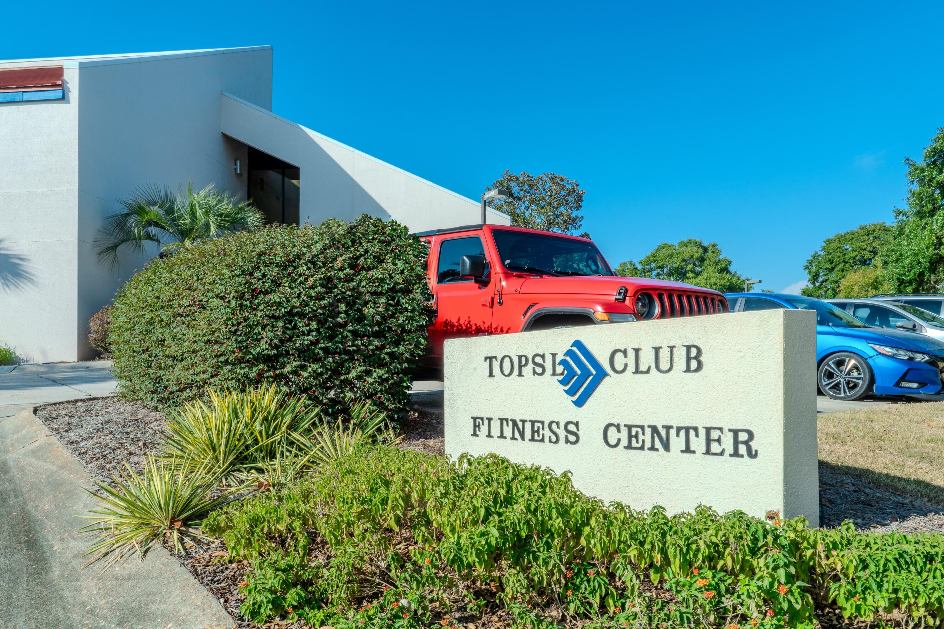 7 Wimbledon Court, Unit 7B Miramar Beach, FL 32550 - Photo 34 of 46 a sign on the side of a building