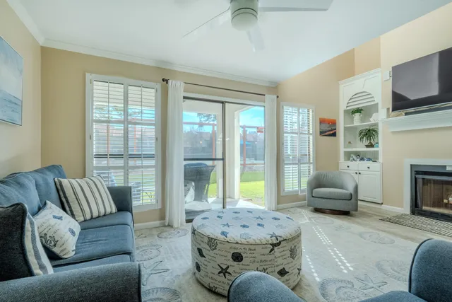 a living room with furniture or fireplace and a flat screen tv
