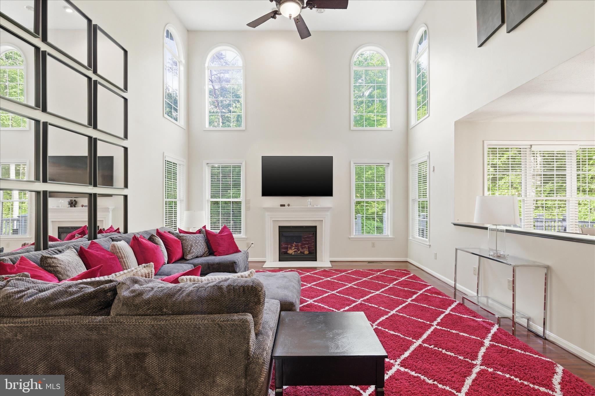 5829 Lockmere Place Waldorf, MD 20601 - Photo 11 of 54 a living room with furniture fireplace and flat screen tv