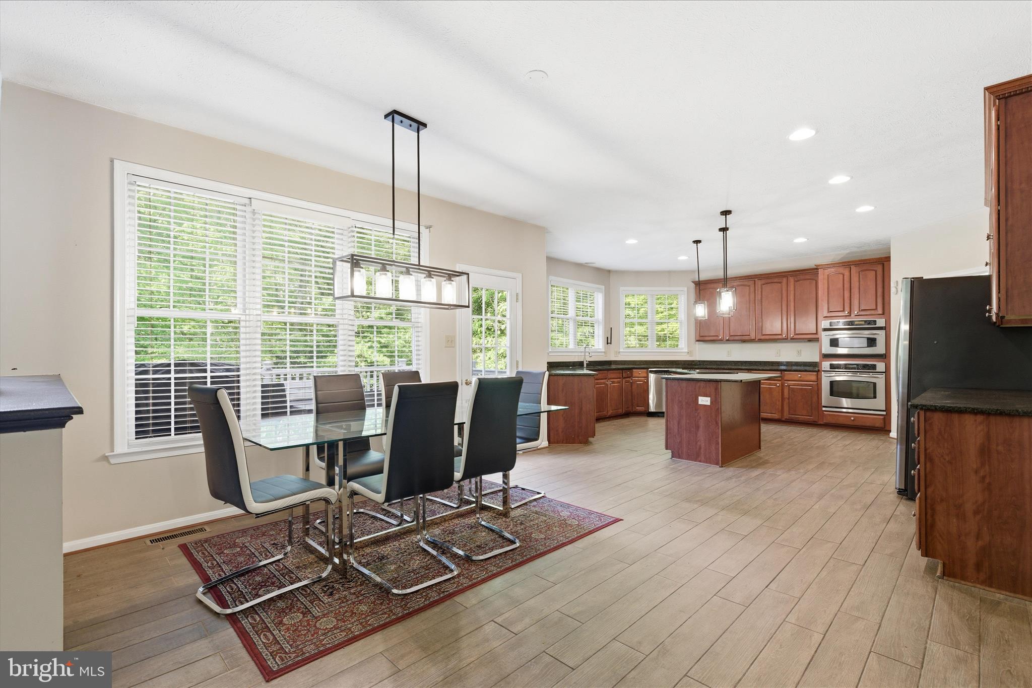5829 Lockmere Place Waldorf, MD 20601 - Photo 15 of 54 a living room with furniture and kitchen view