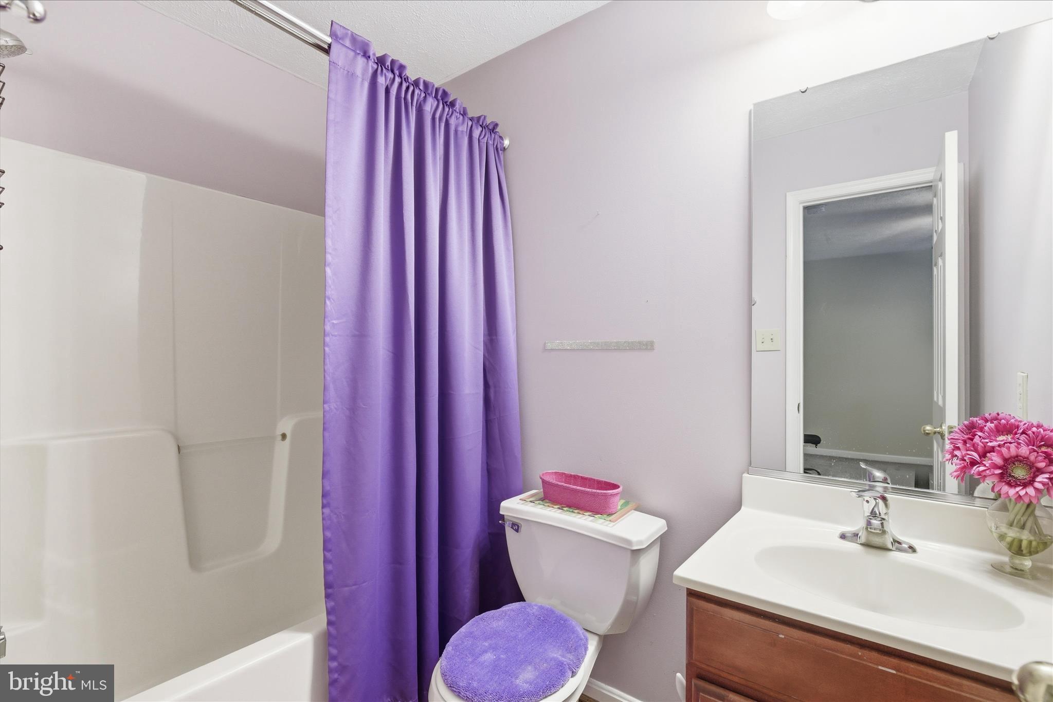 5829 Lockmere Place Waldorf, MD 20601 - Photo 34 of 54 a bathroom with a sink toilet and shower