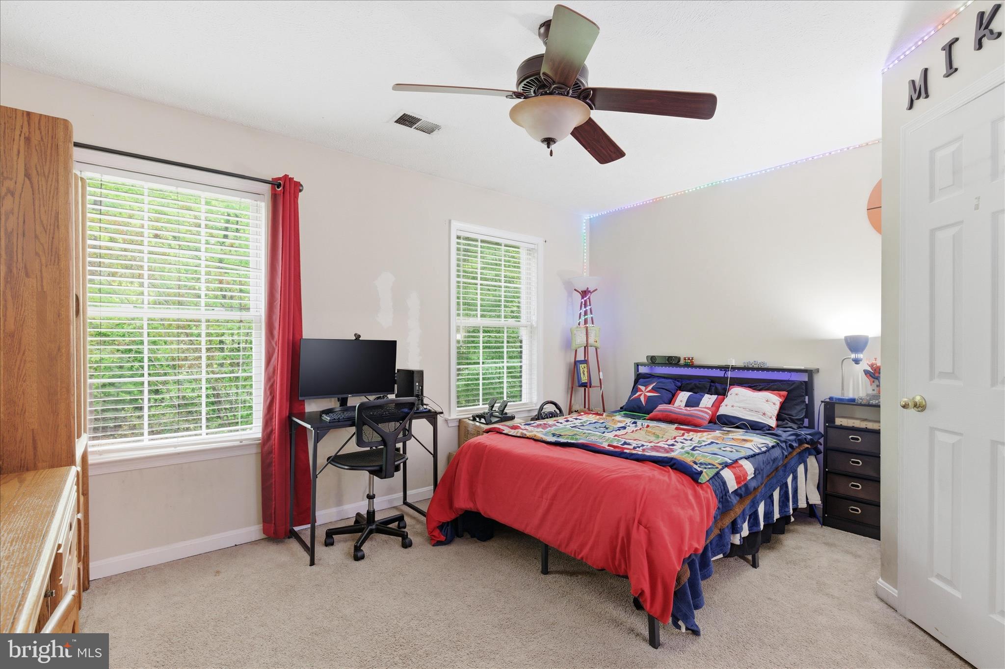 5829 Lockmere Place Waldorf, MD 20601 - Photo 40 of 54 a bedroom with a bed and a large window