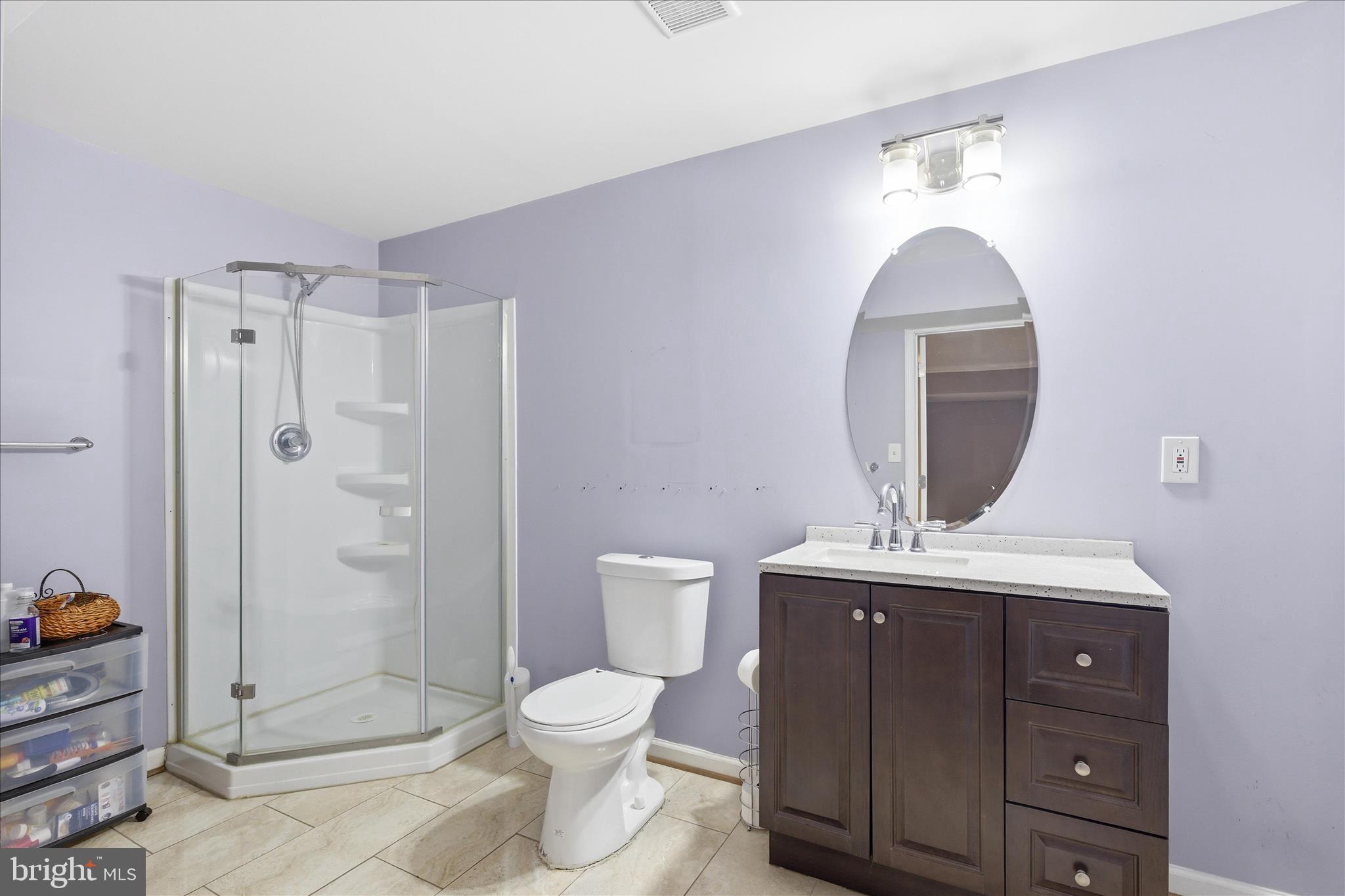 5829 Lockmere Place Waldorf, MD 20601 - Photo 45 of 54 a bathroom with a toilet a sink and shower
