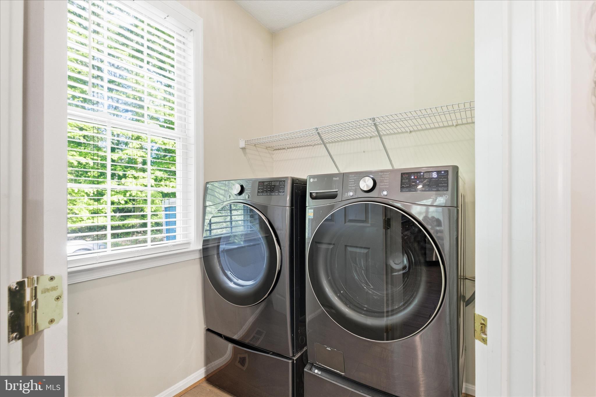 5829 Lockmere Place Waldorf, MD 20601 - Photo 46 of 54 a utility room with dryer and washer