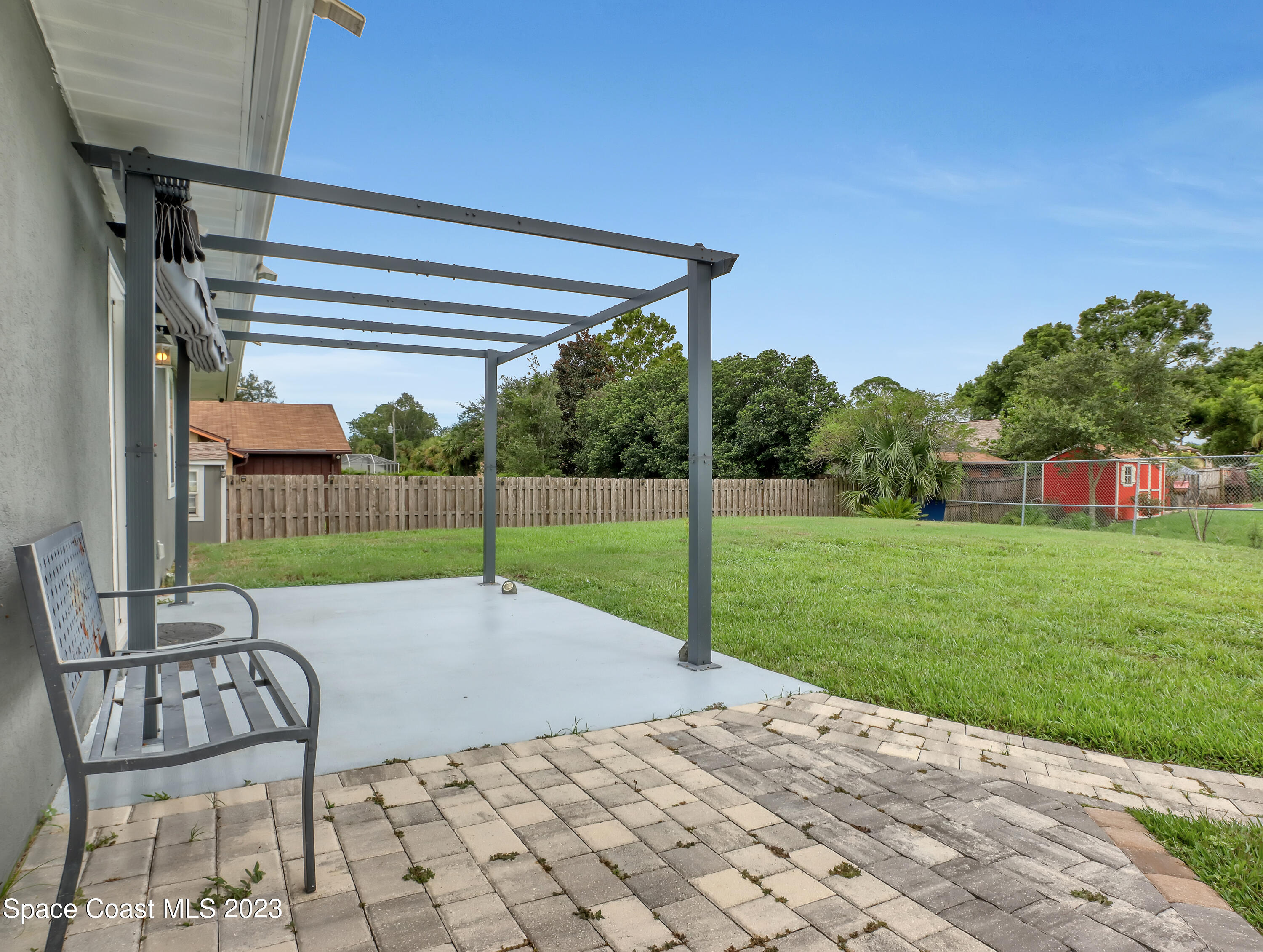 5233 Carrick Road Cocoa, FL 32927 - Photo 24 of 32 a view of a patio with a yard