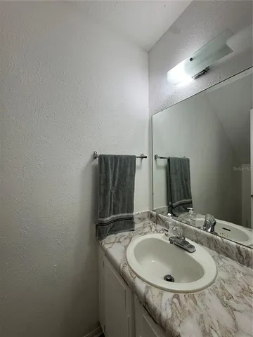 a kitchen with a cabinets and appliances