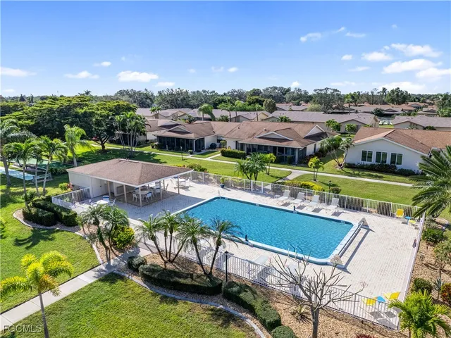 a view of a city with lawn chairs
