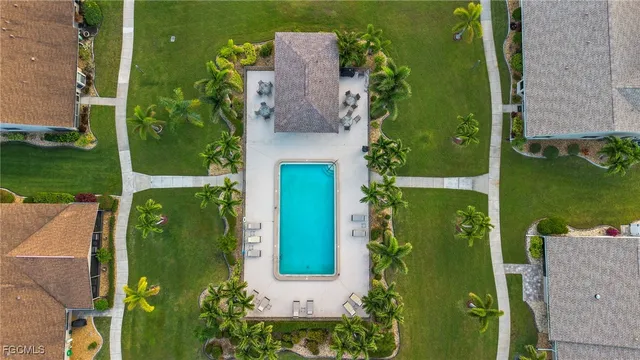 an aerial view of a house with a garden