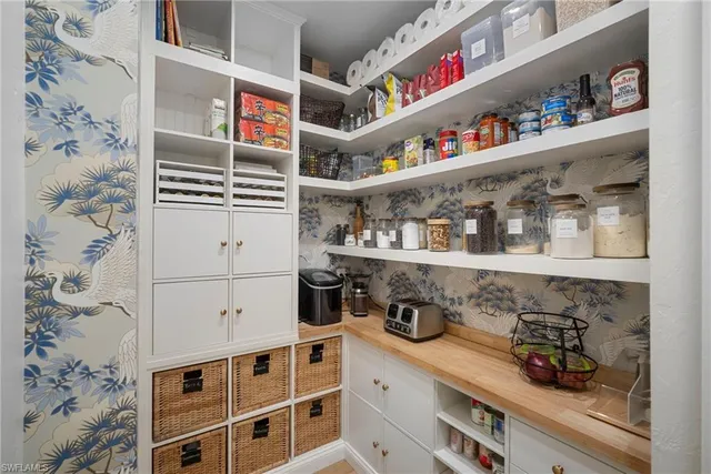 a cabinet with storage and utility