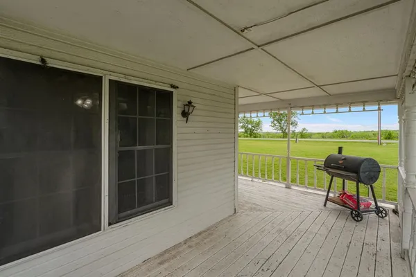 a porch with seating space