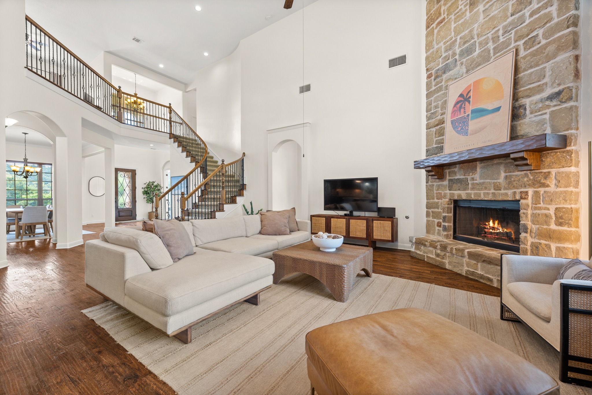 1301 Lions Lair Leander, TX 78641 - Photo 7 of 40 Open living area with warm hardwood flooring