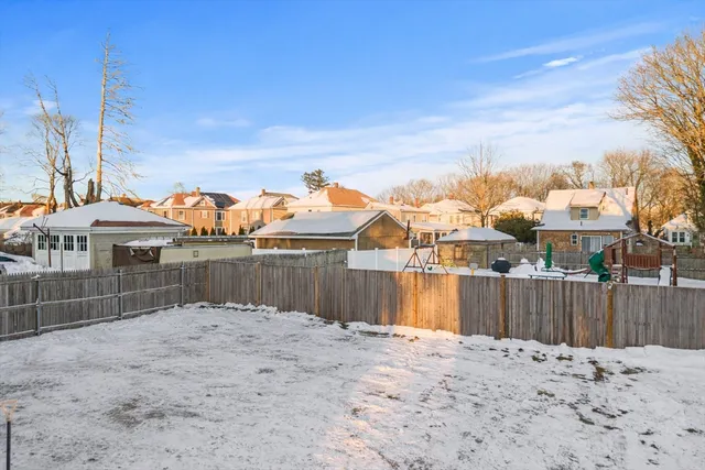 a view of a backyard of a house