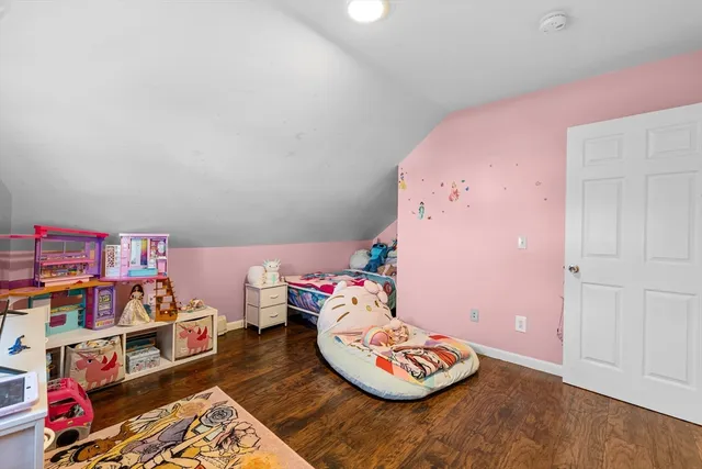 a bathroom with a sink a mirror and a shower