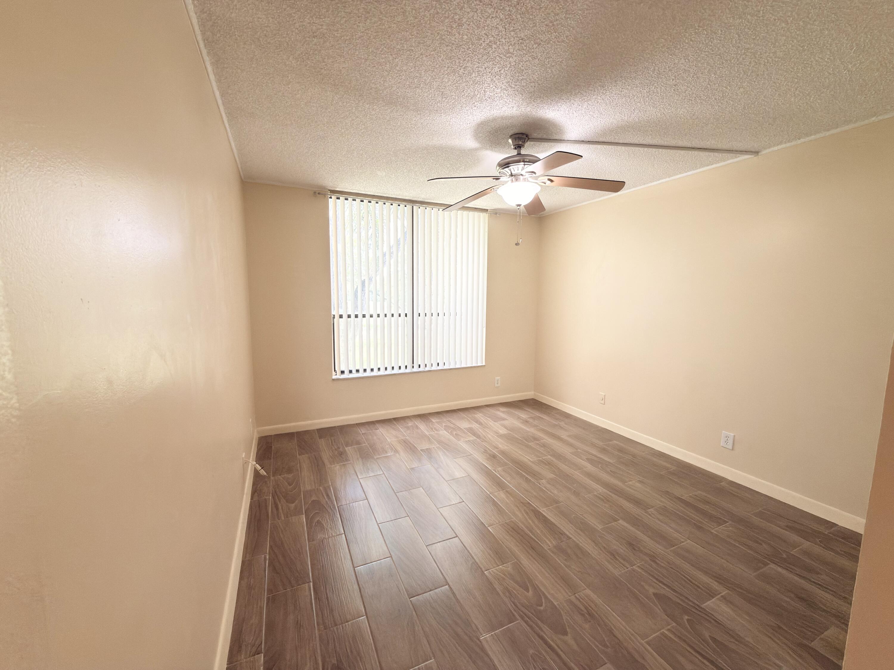 7650 West McNab Road, Unit 210 Tamarac, FL 33321 - Photo 3 of 13 Guest Bedroom
