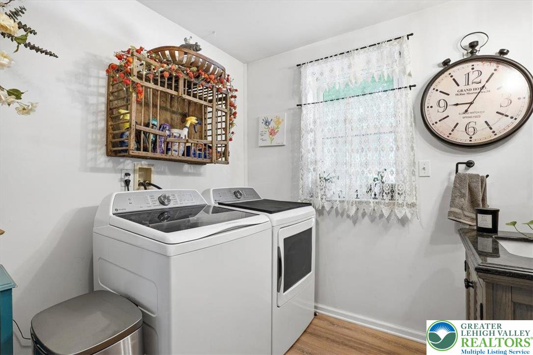 4880 Little Gap Road Kunkletown, PA 18058 - Photo 47 of 100 This dedicated laundry space combines efficiency with a bright, welcoming atmosphere.