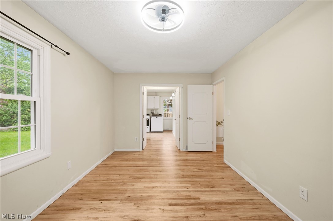 1515 Barlow Road Hudson, OH 44236 - Photo 19 of 31 Bedroom 3 with wood flooring, natural light, and huge walk-in closet and attached bathroom.