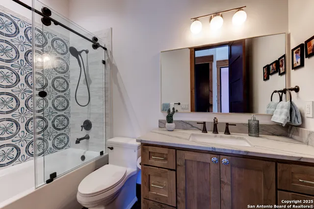 a view of an empty room with a fireplace