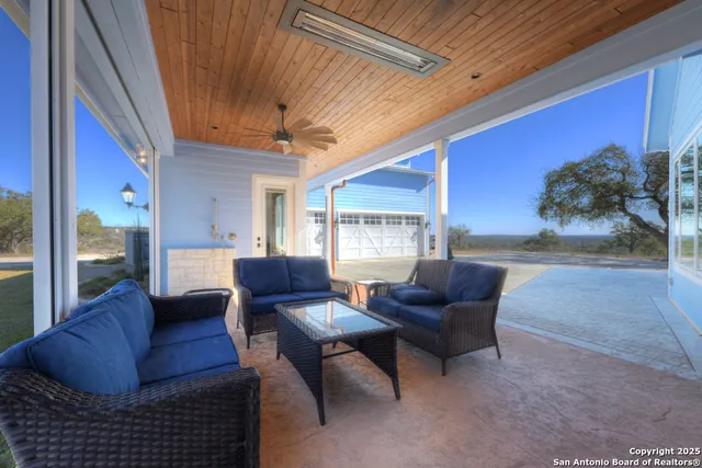 a kitchen with stainless steel appliances kitchen island a stove a sink and a cabinets