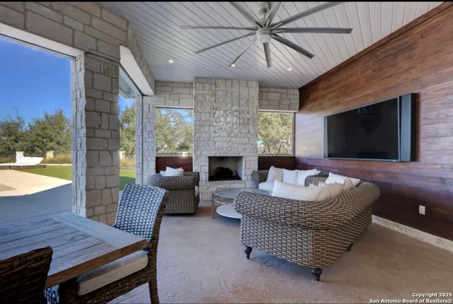 a front view of a building with garage and yard