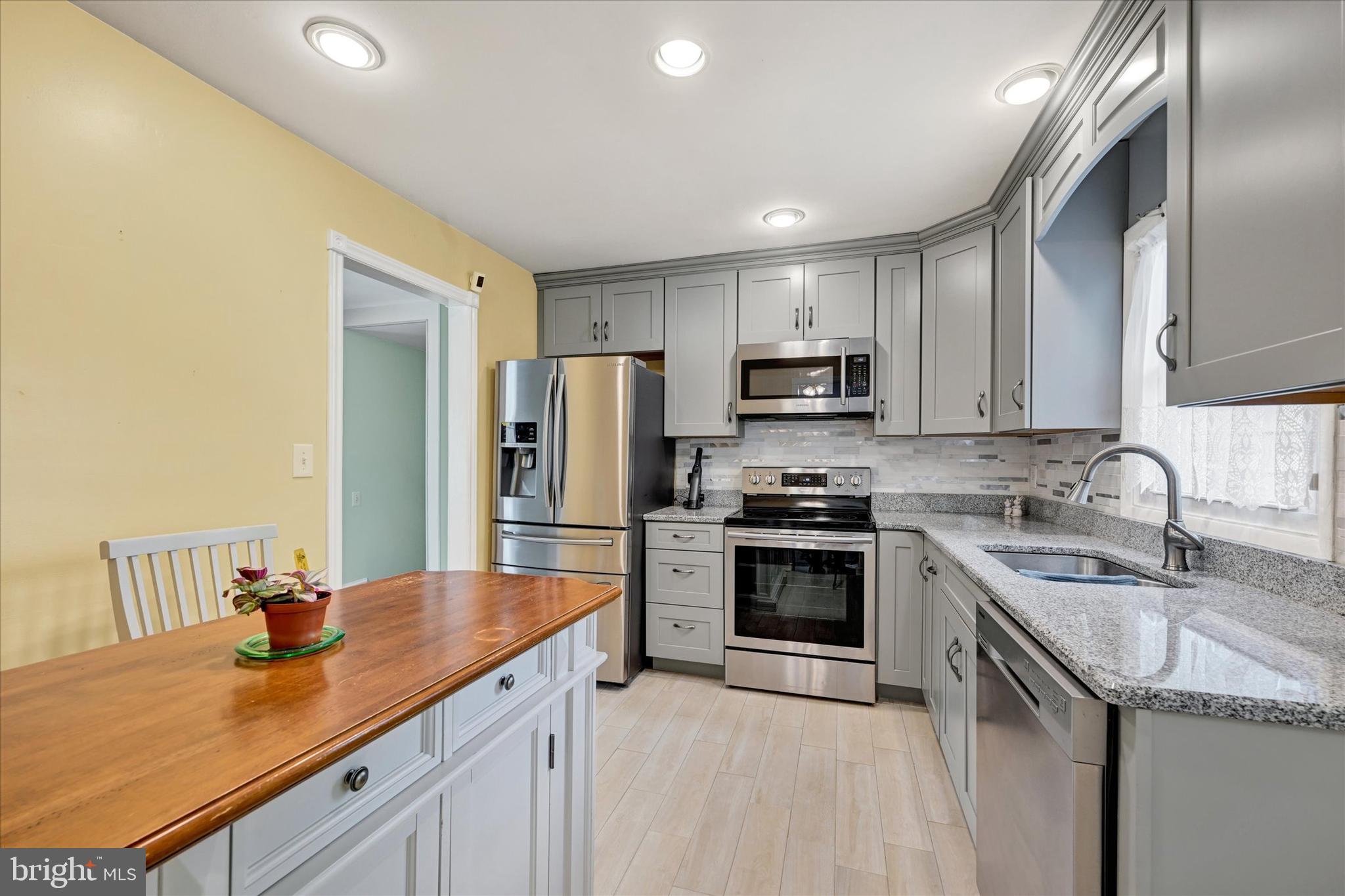 1202 Hillcreek Road Pasadena, MD 21122 - Photo 14 of 35 A lovely backsplash affords easy clean up
