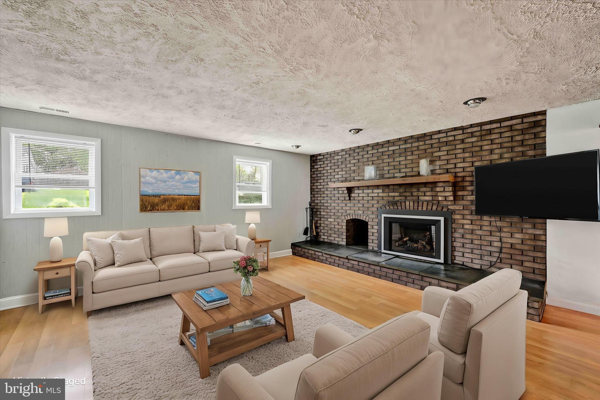 1202 Hillcreek Road Pasadena, MD 21122 - Photo 24 of 35 Lower level family room w/propane gas fireplace