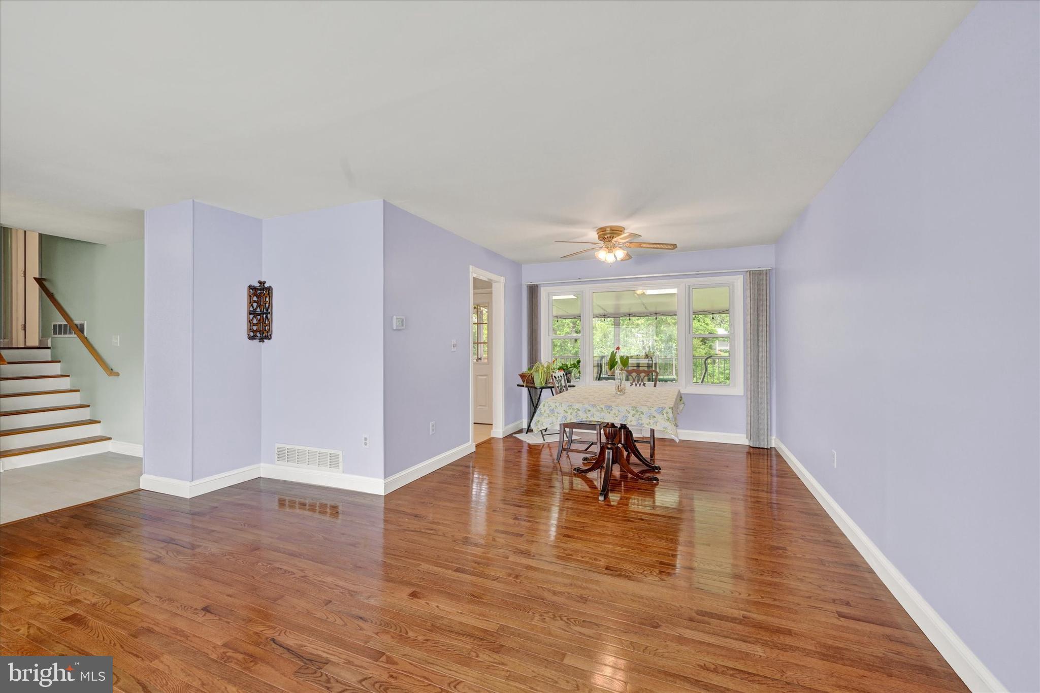 1202 Hillcreek Road Pasadena, MD 21122 - Photo 8 of 35 Generous dining area looks over the covered deck