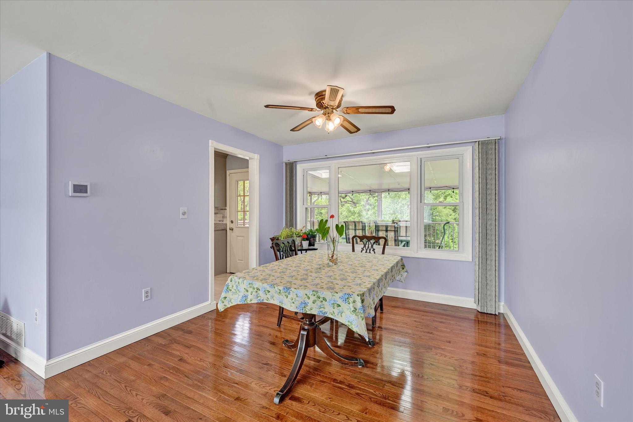 1202 Hillcreek Road Pasadena, MD 21122 - Photo 9 of 35 Large picture window allows full view of backyard