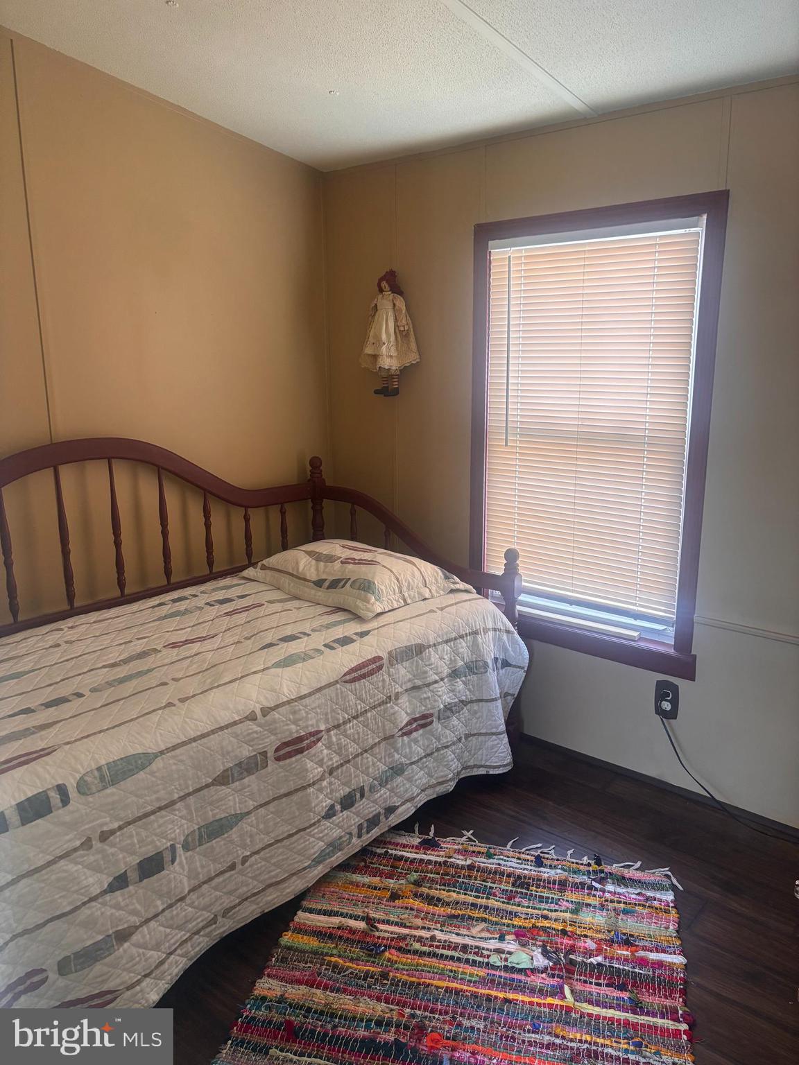 7 Shell Lane Egg Harbor Township, NJ 08234 - Photo 18 of 22 a bedroom with a bed and wooden floor