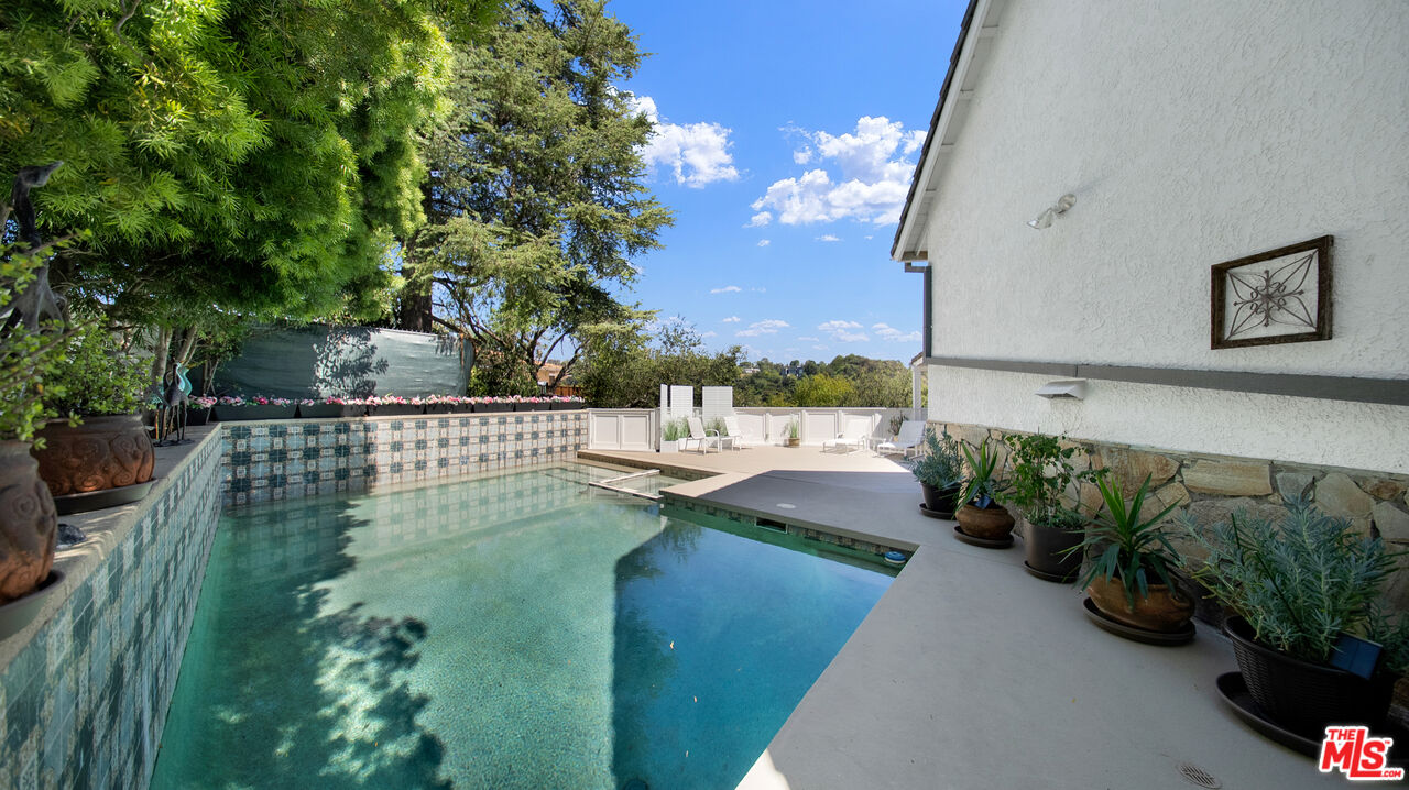 2312 Kimridge Road Beverly Hills, CA 90210 - Photo 18 of 60 a view of a balcony with outdoor space
