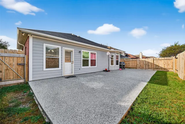 a view of house with an outdoor space
