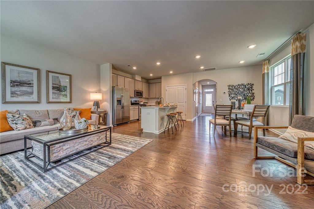 902 Pk Bnd Trail, Unit 72 Tega Cay, SC 29708 - Photo 2 of 13 a living room with furniture and a table