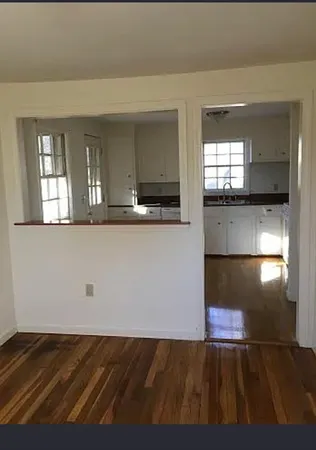 a view of a living room with a window